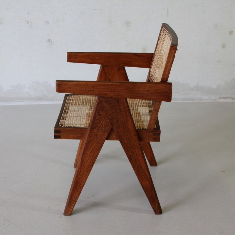 Pair of Chairs with slightly curved back, designed by Pierre Jeanneret for the Chandigarh project, India 1950's.

Teak construction with cane seat and back.

The first built-from-scratch city in post colonial India, Chandigarh was conceived and