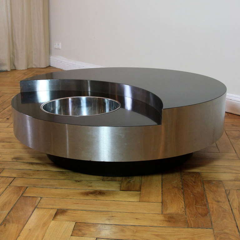 Revolving table/ bar, designed by Willy Rizzo for Emart, Italy, 1971. BLACK laminate surface, brushed metal surround and polished stainless steel bowl insert. AMAZING!

Please note: We also have a Chocolate Brown Table available.