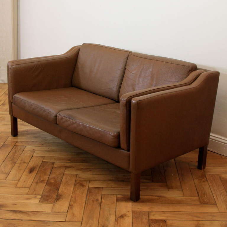Two seat sofa with wonderful subtle dark caramel coloured leather, Denmark Stuby 1970's.