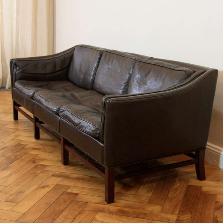 Three-seat sofa with wonderful subtle dark brown colored leather, Denmark, 1970s.