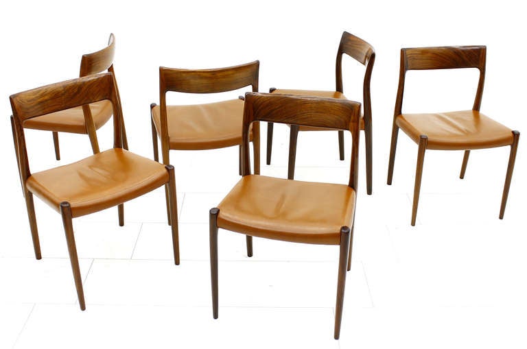 A Set of Six Rosewood and Leather Dining Chairs by Niels O. Moller, No. 77.
Excellent original Condition !

We offer worldwide shipping. Please contact us for a transport offer for a delivery to your door.
