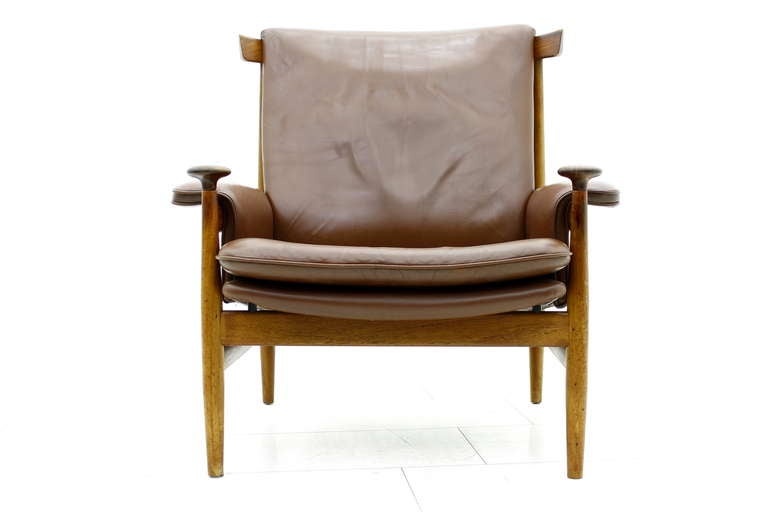 Finn Juhl Bwana lounge chair in teak & brown leather.  Good original condition!
