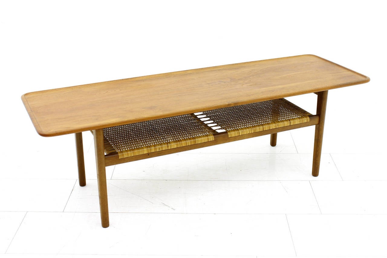Teak wood and cane sofa table by Hans J. Wegner for Andreas Tusch, circa 1950s, Denmark.

Excellent condition!

Worldwide shipping.