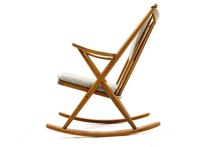 Frank Reenskaug rocking chair model 182. Designed in 1958, Denmark. Solid teak wood, wool cushions.  Excellent original condition.