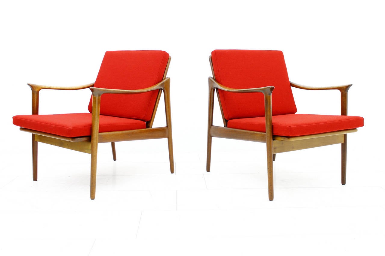A pair of lounge chairs by Fredrik Kaiser for Vatne, Norway, circa 1960s.
Teakwood and new upholstery cushions with Kvadrat fabric.
Dimensions: B 66 cm, T 98 cm, H 78 cm, SH 41 cm.
Very good condition.

Express shipping is worldwide possible.