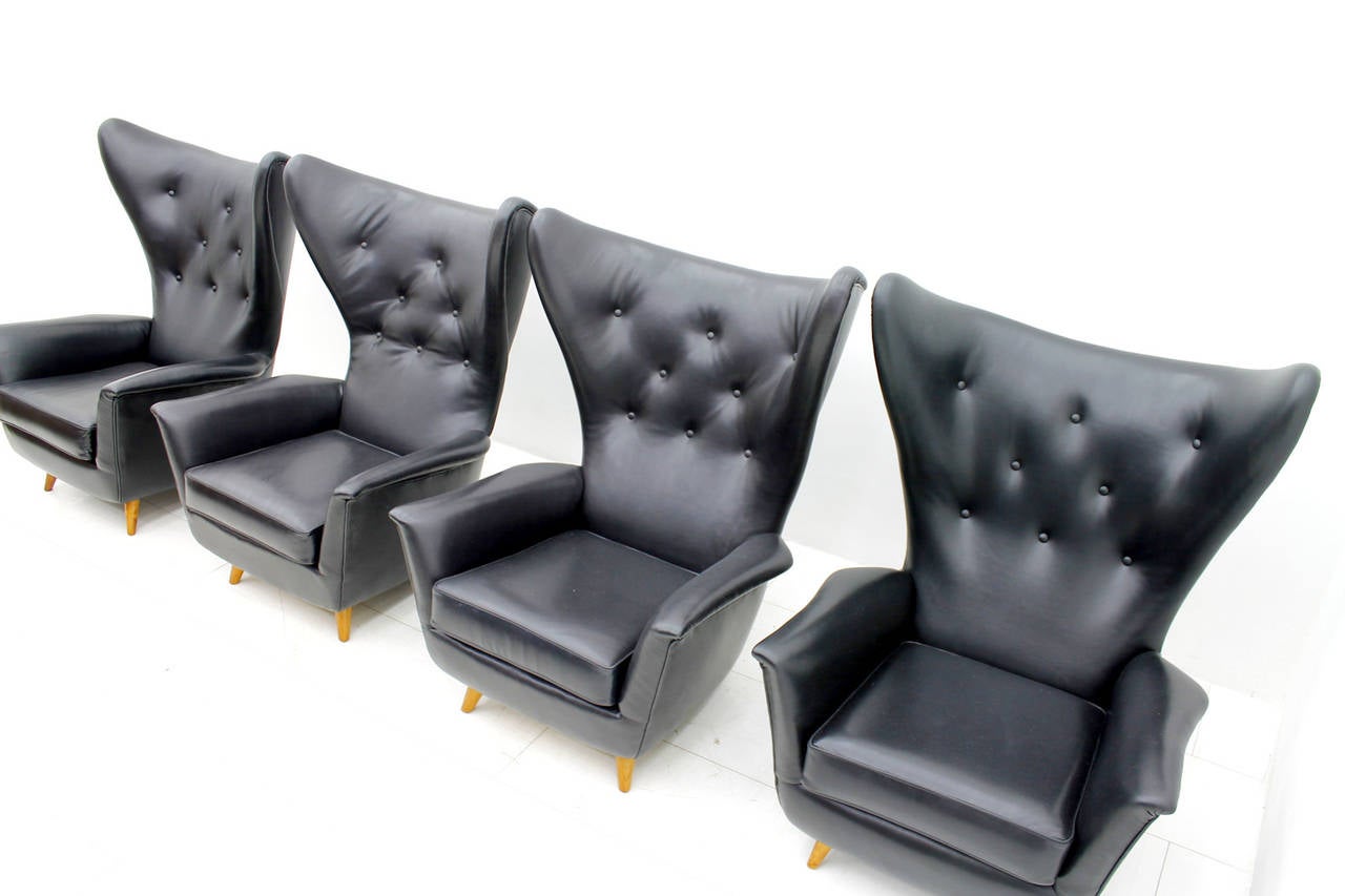 Four Black Leather Wing Lounge Chairs, 1950s For Sale 2