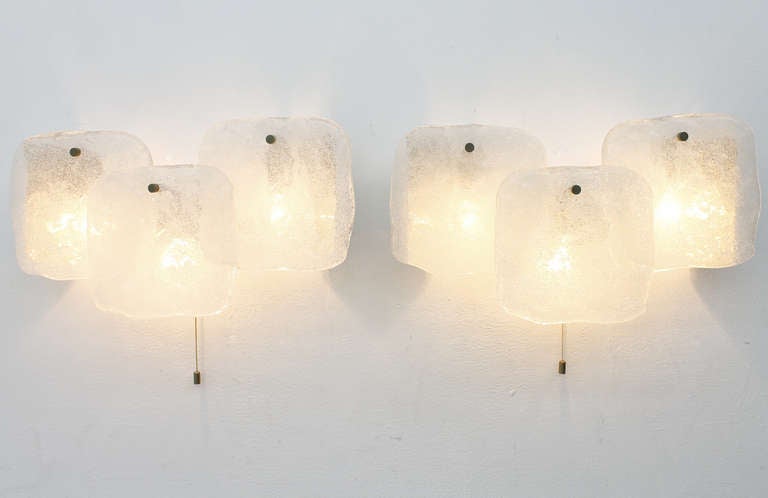 Pair of Kalmar Austria wall sconces, glass and metal ca. 1960`s.

Very good condition.


The Kalmar “Werkstätten” (workshops) are as well part of Austrian culture as of modern design. Julius August Kalmar founded the Viennese company in 1881 as