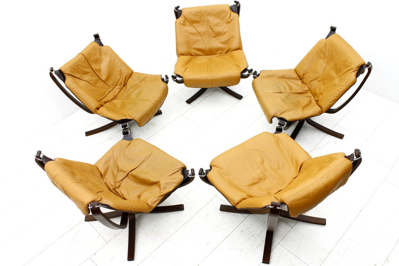 Beautiful lounge chairs by Sigurd Resell for Vatne Møbler, Norway, 1971. Cognac brown leather, canvas and plywood.
Excellent original condition.

Worldwide shipping.