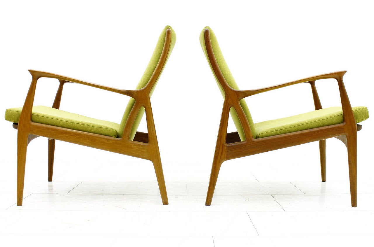 A beautiful pair of teakwood lounge chairs by Erik Andersen, S.A. Andersen & Palle Pedersen for Horsnaes, Denmark, circa 1960s. New fabric.

Excellent condition.

Worldwide shipping.