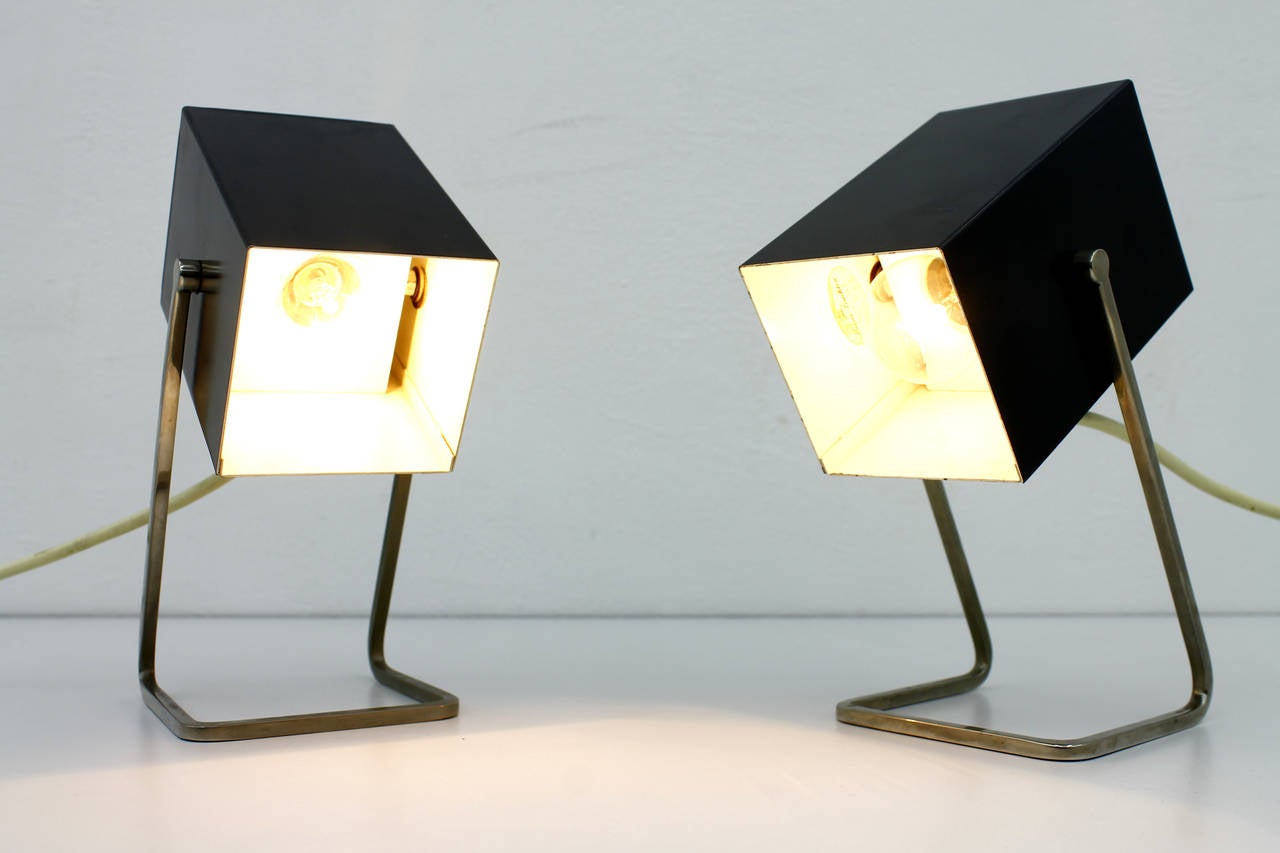 Nice pair table lamps from the 1960s. Black painted metal, chromed base.

Very good condition.

Measurements: H 21 cm, W 13 cm, D 10 cm.

Express shipping is worldwide possible. Please ask us.