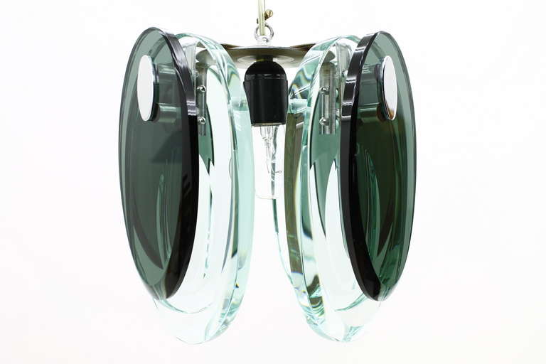 Beautiful Glass Lamp by Fontana Arte, Italy.
Light and dark green Glass, 1,5 cm, and 2cm thick. Beautiful polished Glass.
Excellent Condition.

Worldwide shipping.