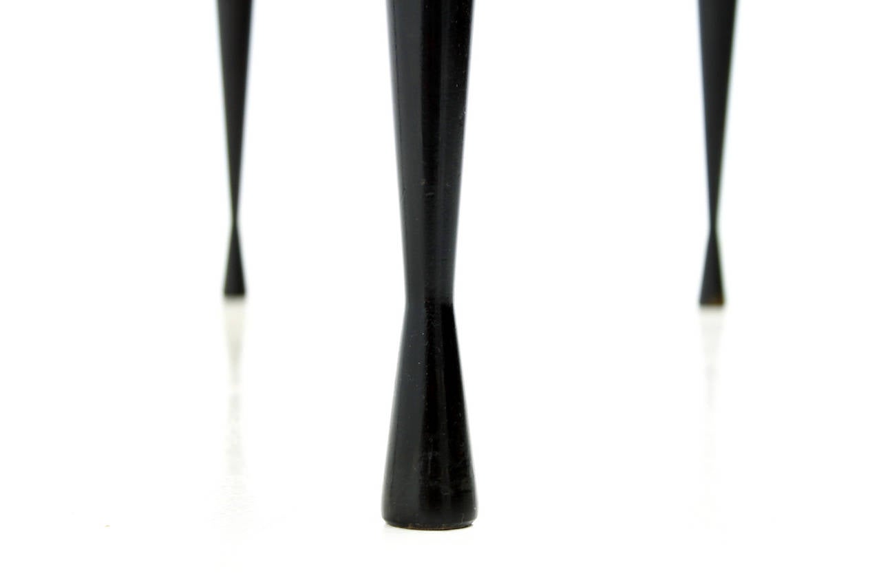 Teak Wood Sofa table with black Lacquered Diabolo Legs, ca, 1960`s.
B 140 cm, T 57 cm, H 48 cm.
very good Condition.
