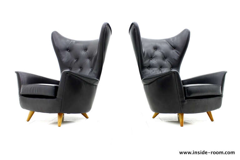 Mid-Century Modern A Pair fantastic Wing Lounge Chairs in black Leather, 1950`s