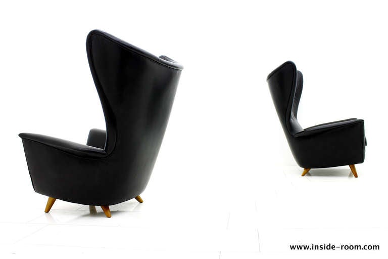 Unknown A Pair fantastic Wing Lounge Chairs in black Leather, 1950`s