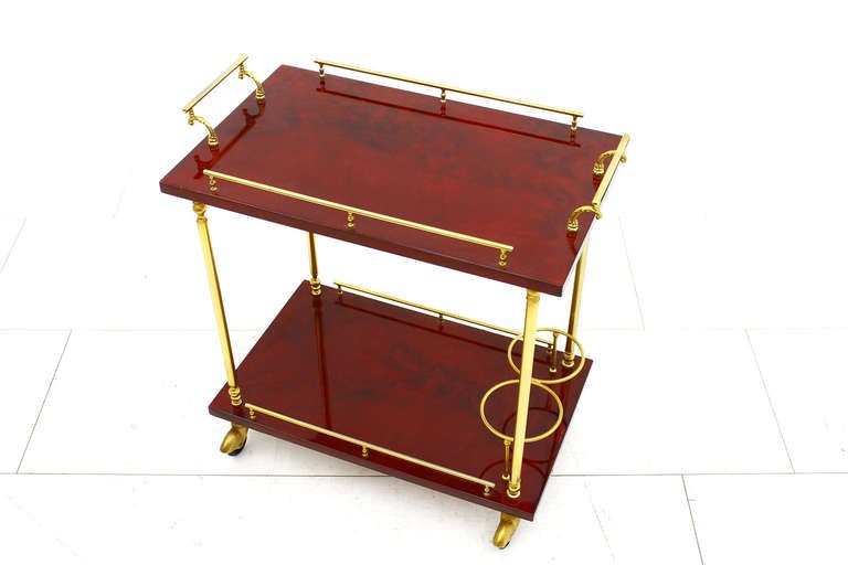 Red Aldo Tura Bar Cart, Goat Skin lacquered, Italy 1960`s

Very good Condition!

Express shipping is worldwide possible. Please ask us.