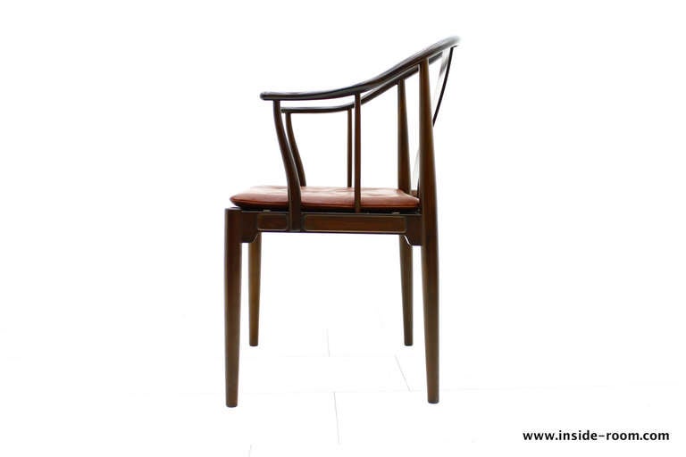 China Chair by Hans J. Wegner, designed 1944. Mahogany & Leather. Made by Fritz Hansen.