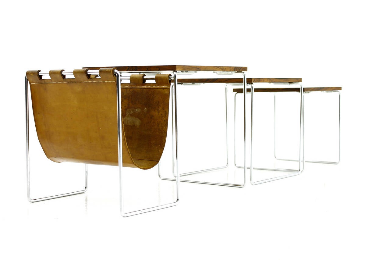 Beautiful Nesting Tables with Magazine Rack, Rosewood, Leather and Steel, 1960`s.

Excellent Condition !

Express shipping is worldwide possible.