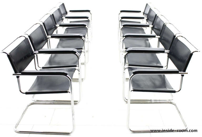 Set of ten original Mart Stam Steel tube Chairs, 1926. This Set is from the Late 80`s and made by Thonet, Germany. Chromed Steel, black Leather and wood Armrests.

