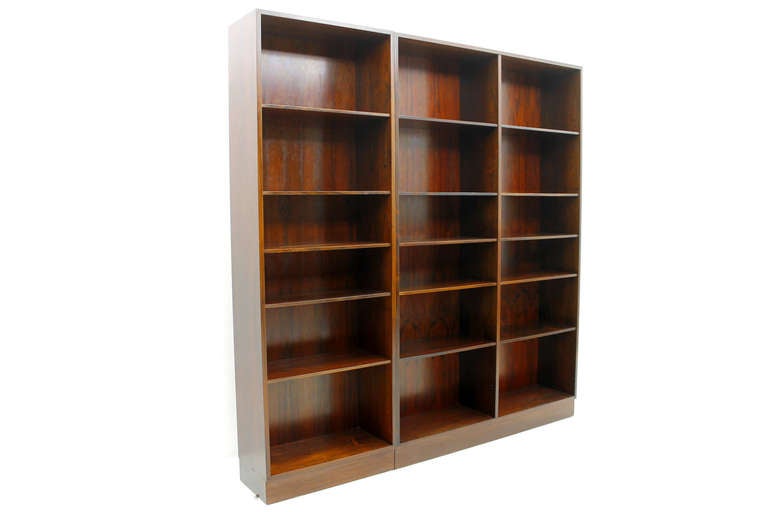 2x bookshelves in rosewood by Oman Jun, Denmark., Ca 1960s. Model 11 & 12
One wide element with 120 cm and 61 cm with a narrow width. Height adjustable shelves.
Great Rosewood Veneer, very good condition.
H 187 cm, D 29 cm, width 61 cm and 120