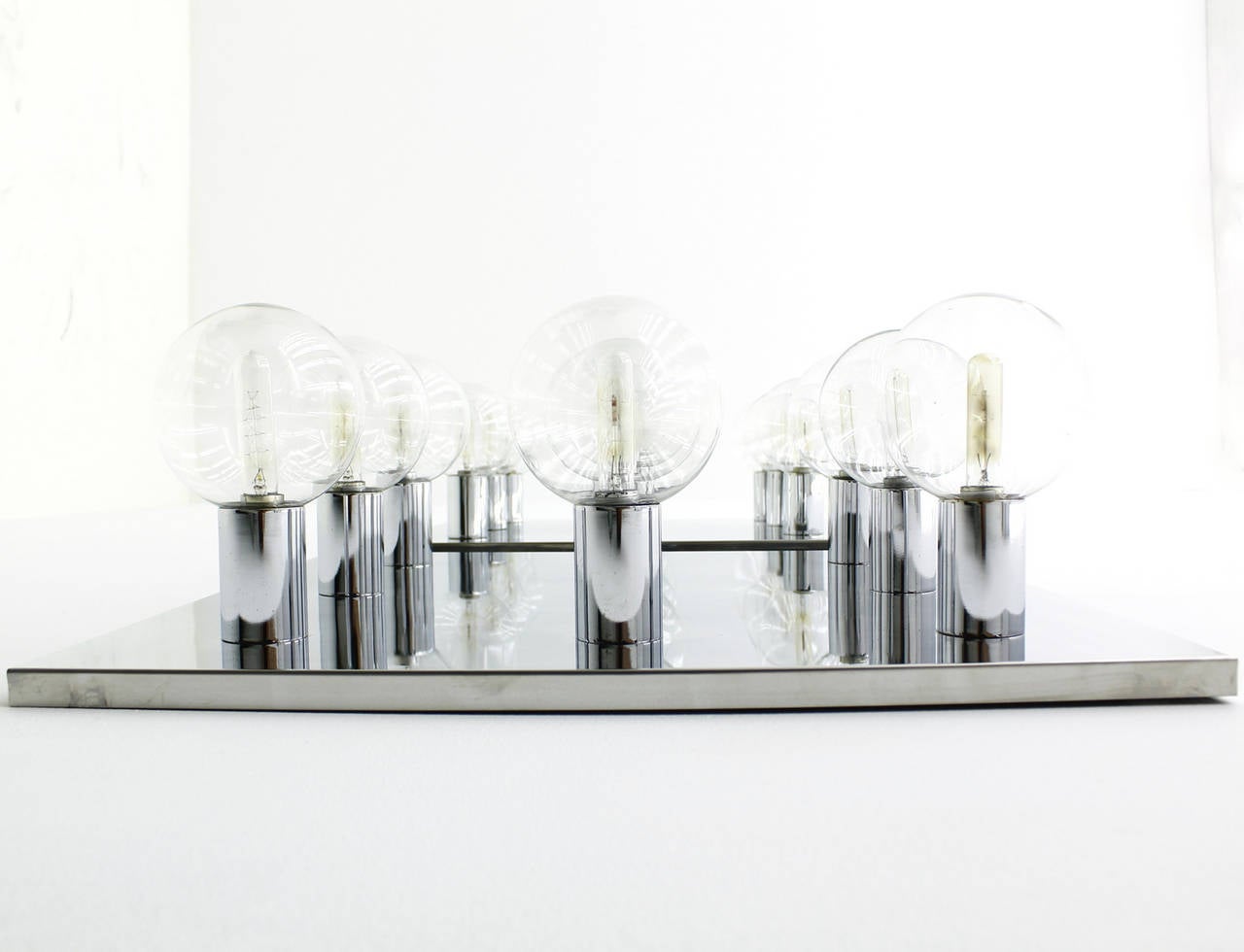 Late 20th Century Pair of Motoko Ishii Chrome and Glass Wall Sconces by Staff, 1970s