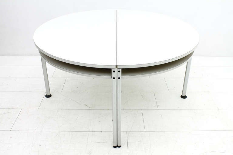 Rare two half round Tables together to make a round conference or dining Table from the Program 570, Dieter Rams, 1957 for Vitsoe, Germany. Aluminum, laminate.

W 146 cm, D 73 cm, H 74 cm.

Very good original condition!