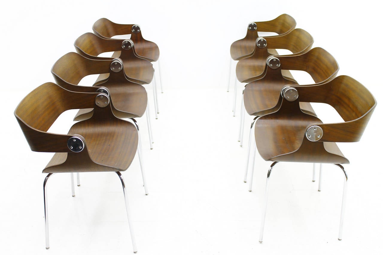 Set of Eight Plywood Dining Room Chairs by Eugen Schmidt, Germany, 1966-

Good original Condition.

We offer a free shipping to your front door into Europe.
The delivery time takes only a few days. A very safe packing is included. 

Shipping