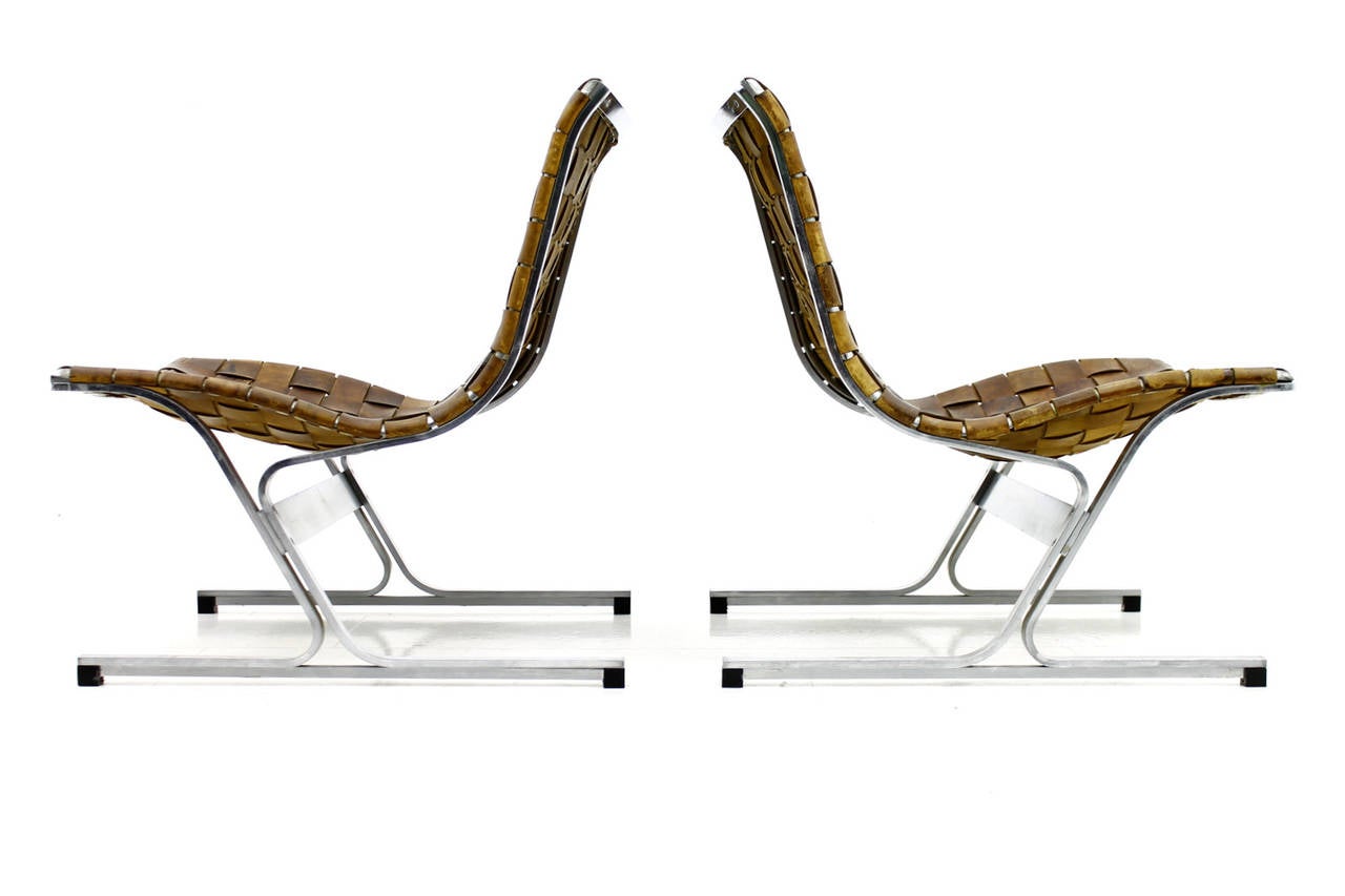 A beautiful pair leather lounge chairs PLR 1 by Ross Littell, 1968. Chromed steel and original leather with fantastic patina.

Excellent original condition.

We offer a free shipping to your front door within Europe.
The delivery time takes