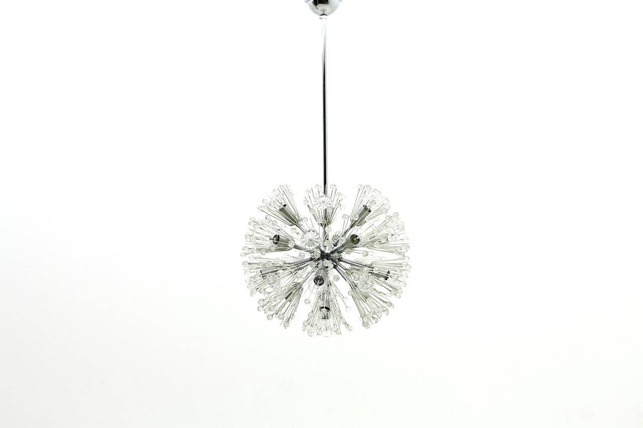 Beautiful Emil Stejnar chandelier snowball, glass and chrome.
Measures: Diameter 45 cm.
17 bulbs with an E 14 socket.

Worldwide shipping.
 