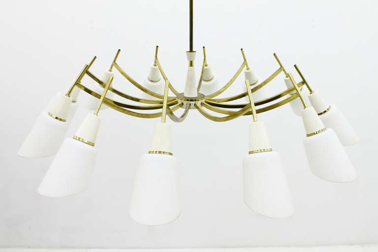 Beautiful Glass and Brass 12 Arm Chandelier from Italy, early 1960`s. 
Very good Condition.

Worldwide shipping