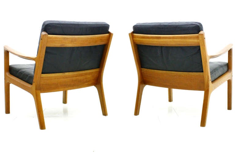 Scandinavian Modern A Pair Leather & Teak Wood Lounge Chairs by Ole Wanscher, Denmark