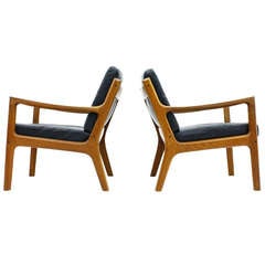 A Pair Leather & Teak Wood Lounge Chairs by Ole Wanscher, Denmark