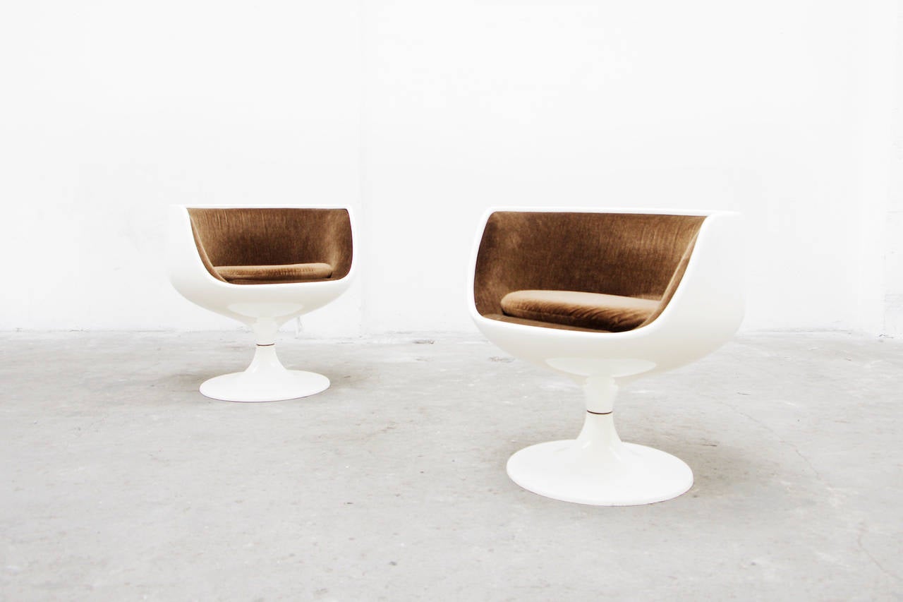 Beautiful pair of swivel chairs by Eero Aarnio for Asko Finland.

Set Sessel by Eero Aarnio Cognac chair Asko Mid Century Modern Design