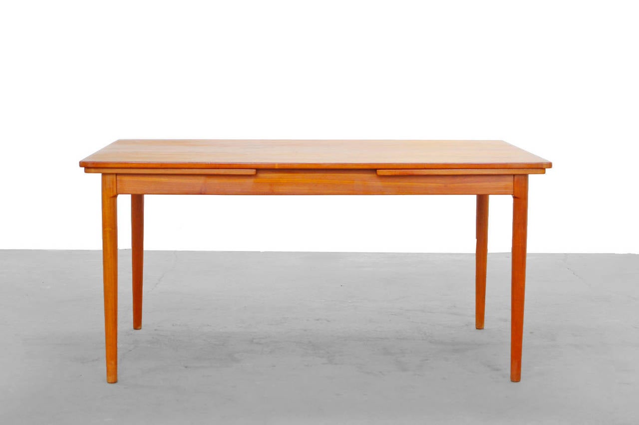 20th Century Expandable Teak Dining Table attr. to Harry Ostergaard