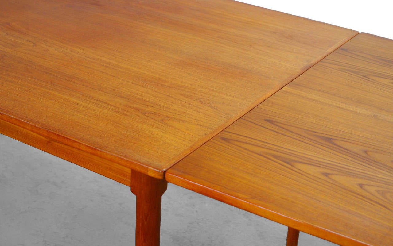 Danish Expandable Teak Dining Table attr. to Harry Ostergaard