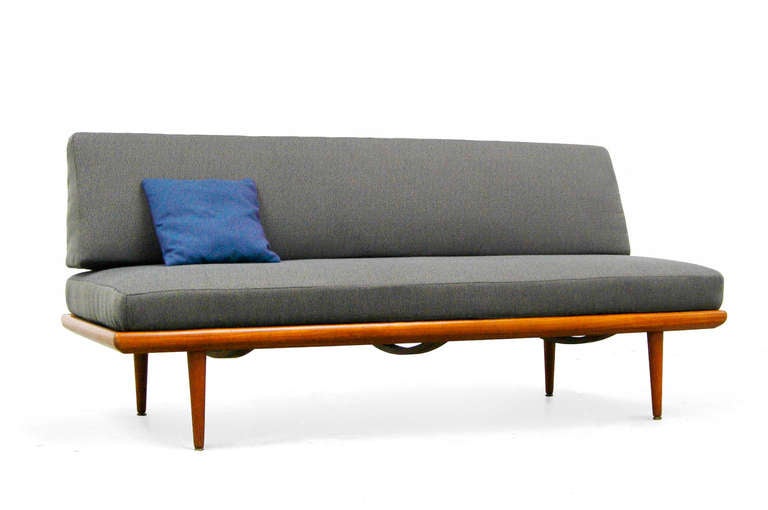 One of the most popular Daybed of the Danish modern history.
Designed by the famous duo Peter Hvidt and Orla Moolgard Nielsen.
Made of solid teakwood, the construction is of the highest quality and what one would expect from France &