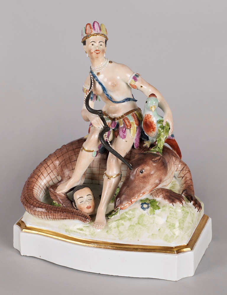 This porcelain group is part of series of allegories of the four continents known at this time (America, Africa, Europe, Asia). The characteristic elements of all of the four allegories are female figures placed in the center and seated on animals