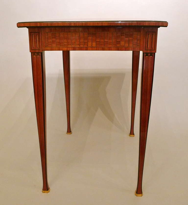 By Jean-Adelbert Vovis (1735 – 1804)
Stamped VOVIS
Master since May 10th 1767
A very rare and elegant petite table a ecrire. The corpus made of oakwood and sprucewood veneered with tulipwood, boxwood and blackened fruitwoods. Downward tapering