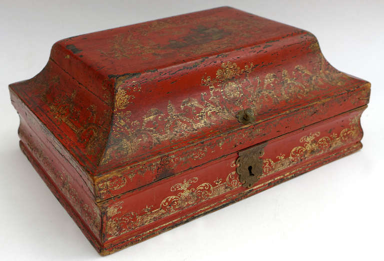 A very decorative and lavishly decorated French Rococo box from the second quarter of the 18th century. Red lacquered (vernis martin) with gilt arabesques and chinoiserie decoration. Probably part of a toilet service ('nécessaire de toilette') for