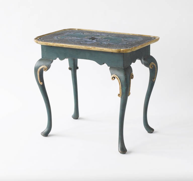 Rare Rococo centre table from the famous workshop of Johann Michael van Selow. The rounded rectangular dished top with moulded edge and decorated with a mosaic made of glass beads depicting a bird seated in a branch framed by scrolling foliage,