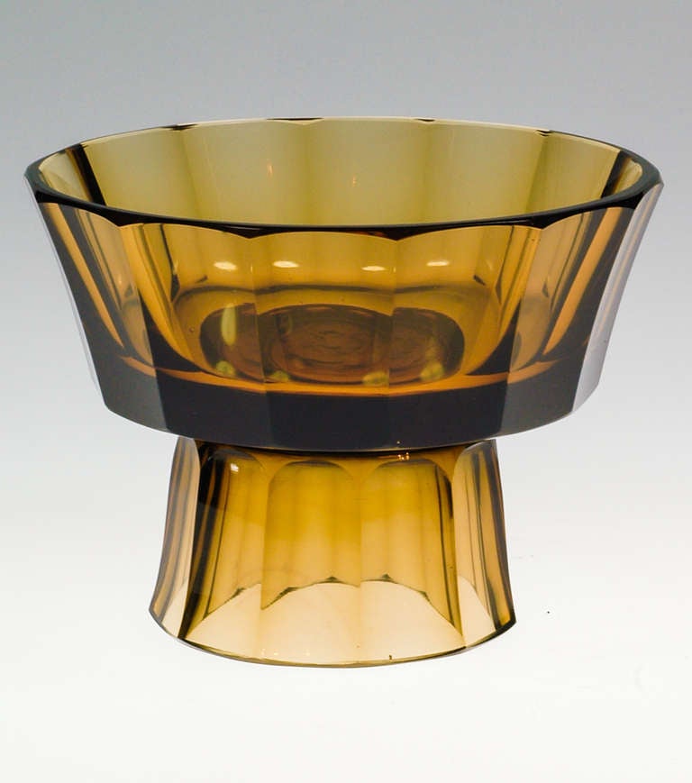 This centerpiece was designed by Josef Hoffmann. It was executed after 1920 which can be determinated by the etched mark on the bottom: the strokes at the top and bottom of the mark 