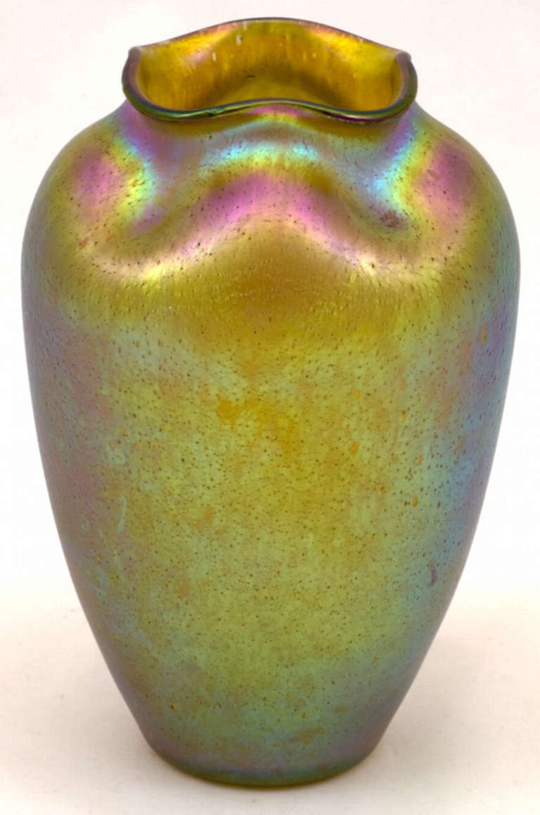 The Silberiris decor was invented between 1899 and 1900. It is one of the most iridescent decors developed by the art glass studio Loetz Witwe Klostermühle and was used for Vases made for the world exhibition 1900 in Paris. Also, some famous