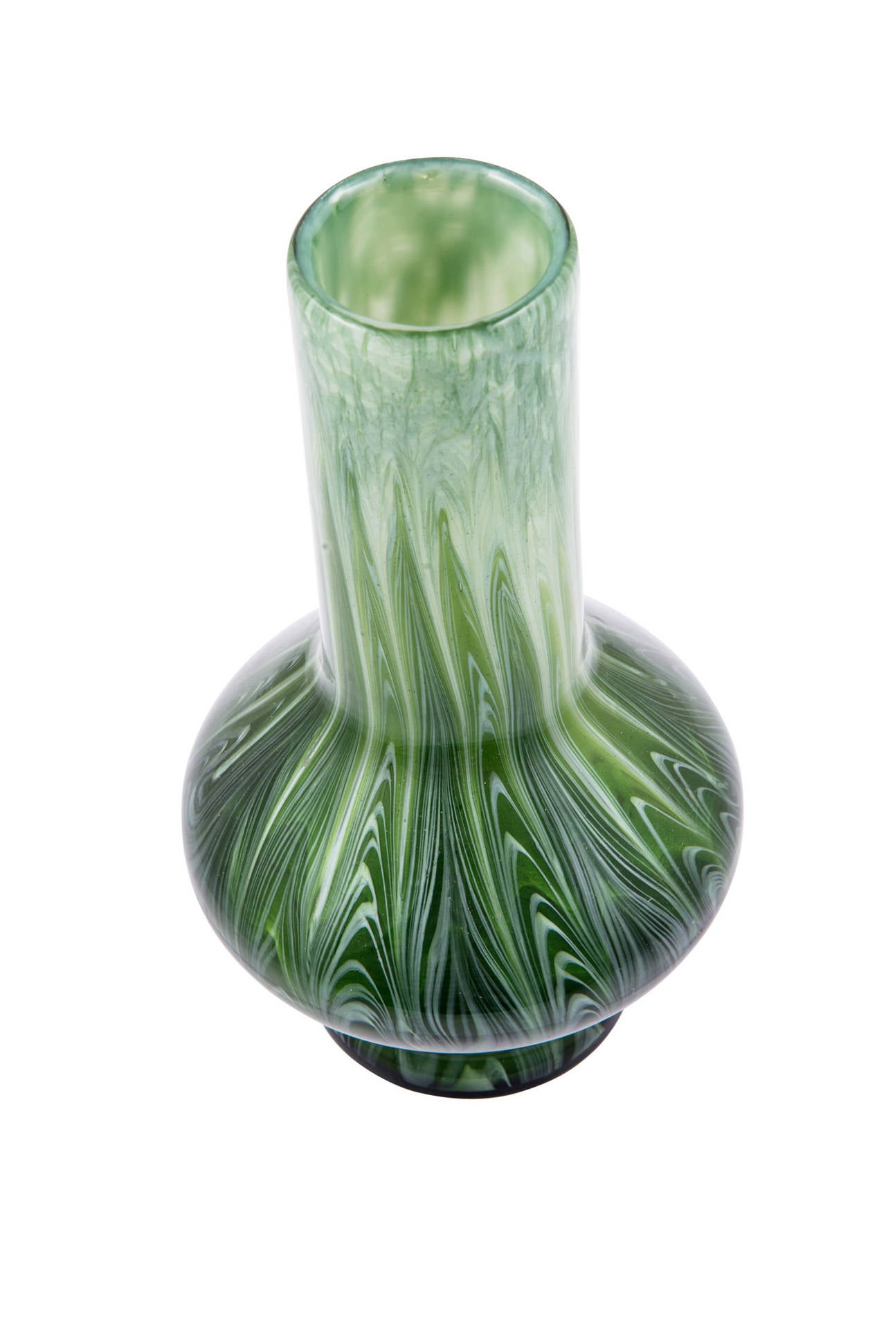 The group of decorations of the Titania group ranges among the most extravagant genres ever produced by Loetz. Glasses in this variant always proved to be a challenge for the executing craftsmen and every vase is slightly different.
This vase is
