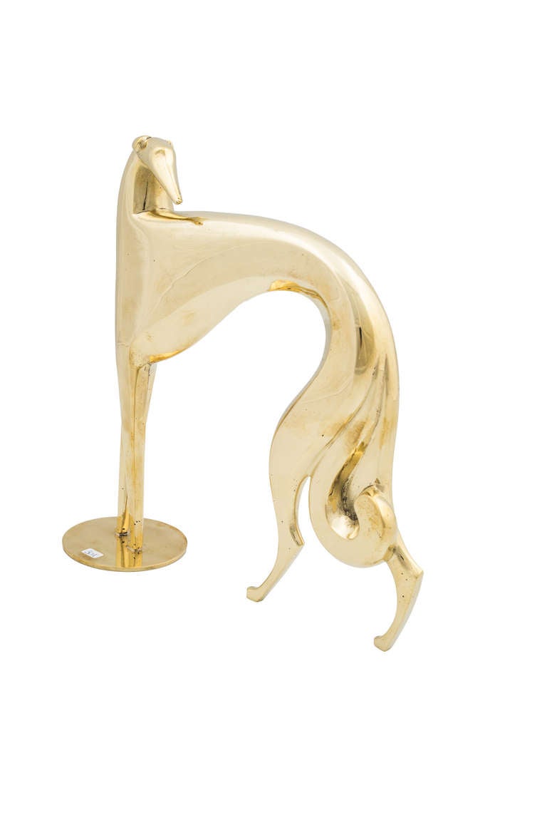 Depictures of animals were a popular motive throughout the activity of the Werkstatte Hagenauer. This greyhound was designed around 1950 and bribes the viewer with a sublime, elegant and powerful portrayal. It is executed in a high quality and the