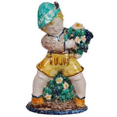 Austrian Steyr Sommerhuber Styrian Putto with Lederhose and Flowers, circa 1925
