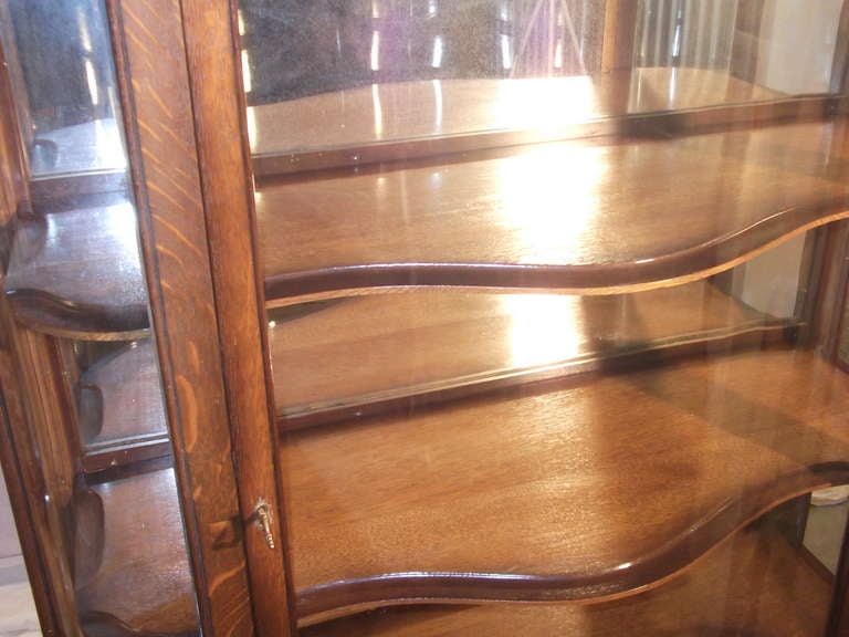 Serpentine Glass Front Display Cabinet For Sale 1