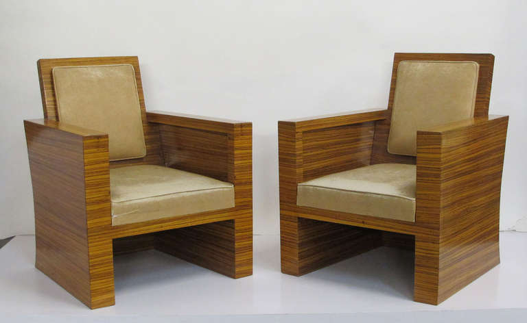 Beautifully designed fine art deco chairs crafted with distinctive zebrina wood veneers that retain their original upholstery.