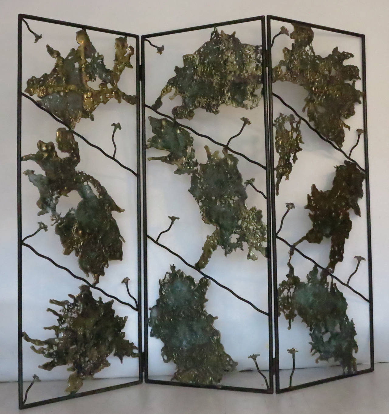 Beautifully crafted spill cast bronze screen/room divider in the style of Silas Seandel or Harry Bertoia, consisting of three panels, each measuring 76
