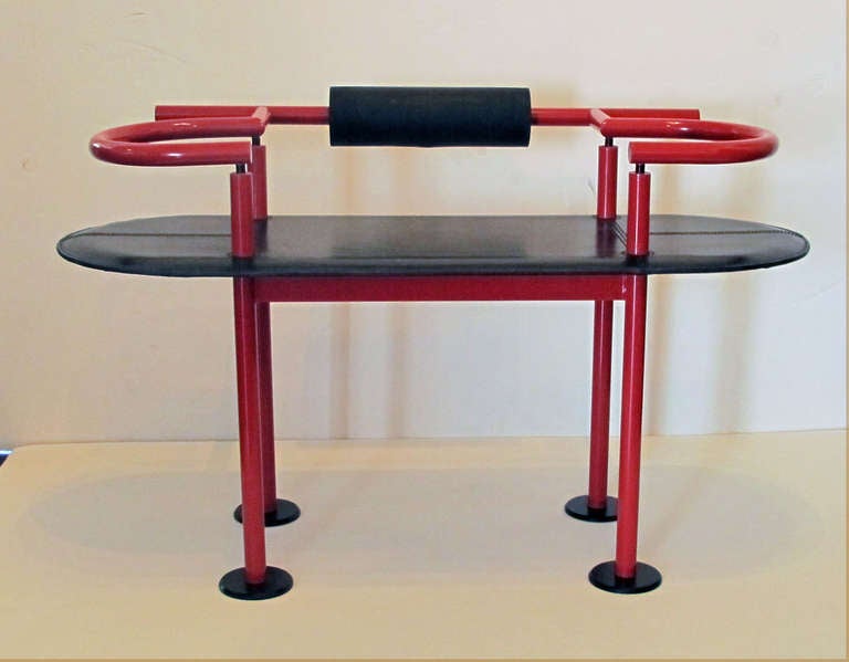 Red enamel with leather upholstery Ettore Sottsass bench.