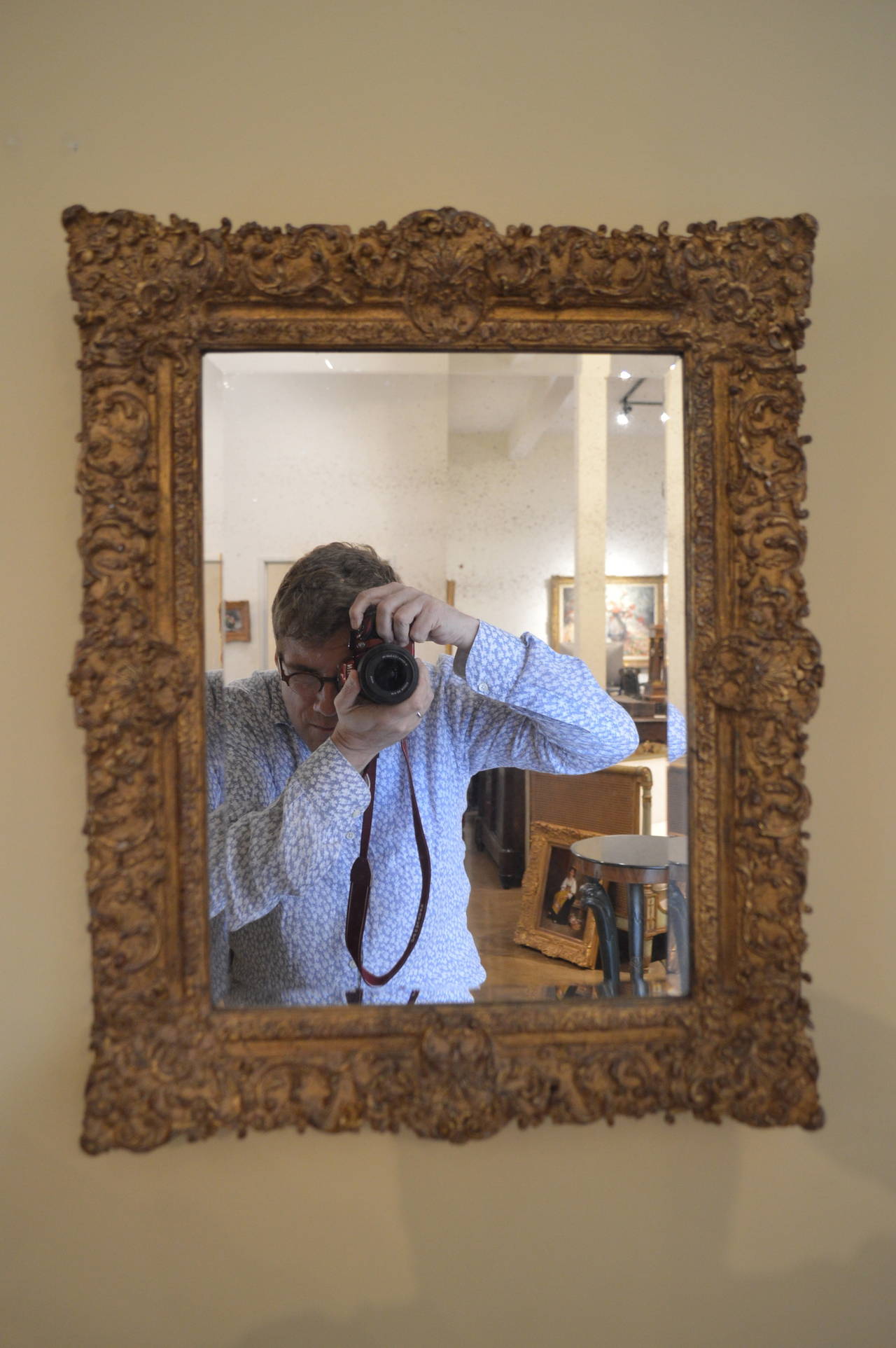 Exquisite genuine gold leafed French antique mirror.
Bevelled mirror.
