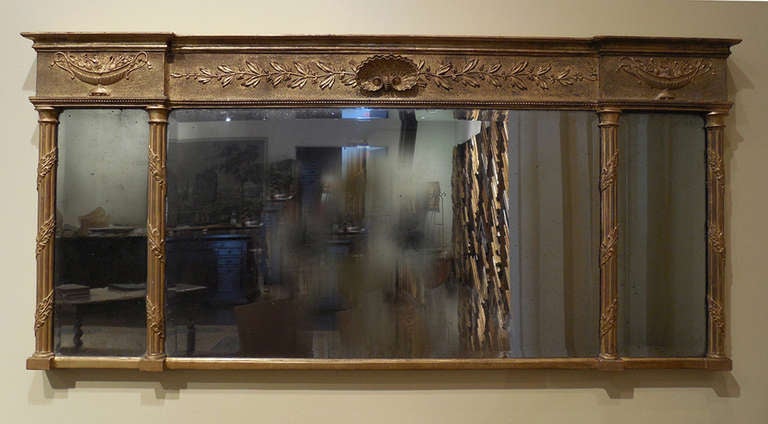 Carved, gilded mirror created by Thomas Fantham, London
Circa 1775 - 1810